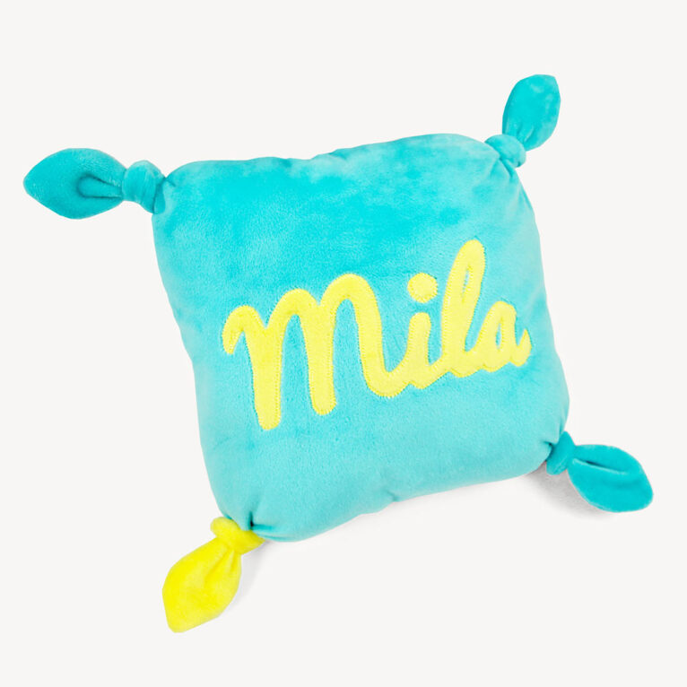 Free sewing pattern for cute baby pillow with knotted corners