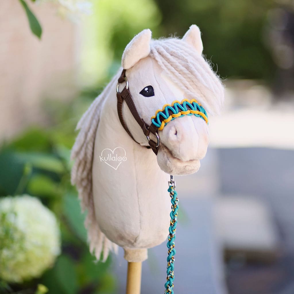 Hobby horse with head collar and braided noseband