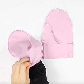 Instructions for free mittens sewing pattern: insert outer mitten into lining mitten, right sides together, step 2