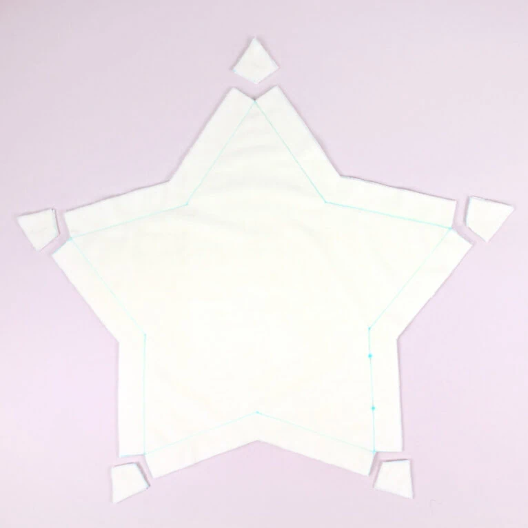 How to sew a star pillow using our free template: trim the corners