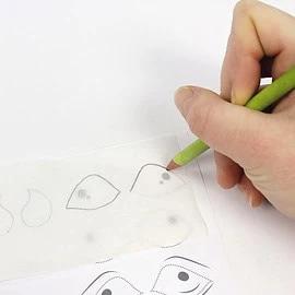 Attach eyes to a Hobby horse: Trace the eye and nostrils shapes to the webbing