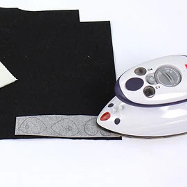 Attach eyes to a Hobby horse: Iron the interfacing to felt