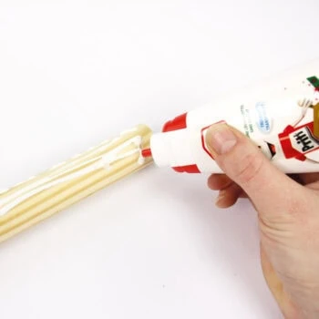 Make a Hobby Horse: How to attach the stick to a Hobby Horse: Add glue to the stick end
