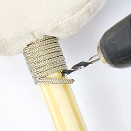 How to make a Hobby Horse: Wrap rope around the stick opening