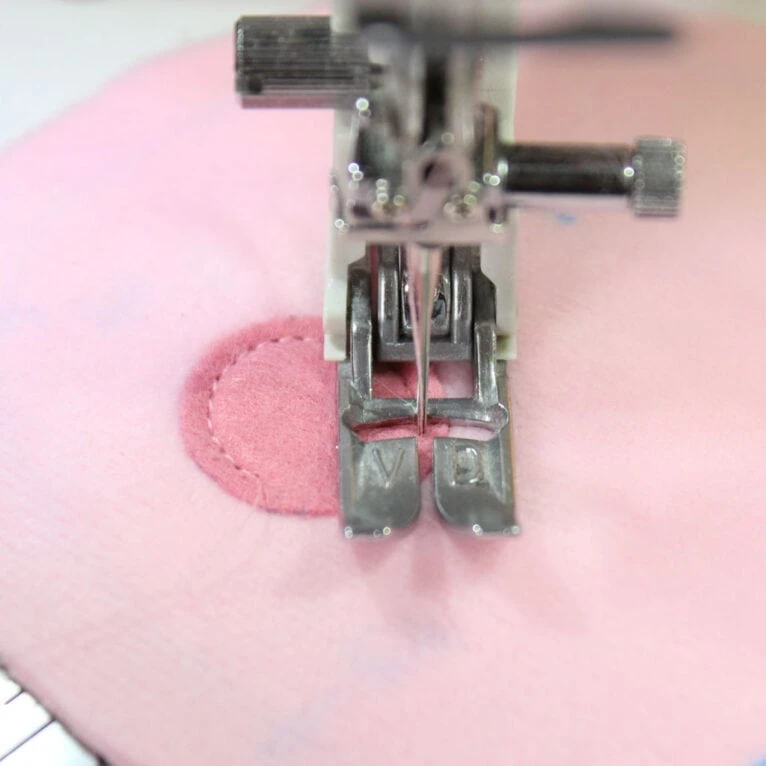 Applique on minky fabric using Heat'n Bond: Sew elements in place using a straight stitch