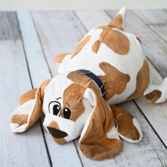 Handmade dog stuffed animal with brown patches on white minky fabric