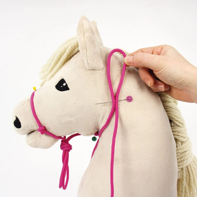 How to tie a halter with rope for a hobby horse: step 13